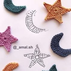 crocheted stars and crescents are arranged together