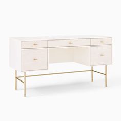 a white and gold desk with two drawers on one side, an open drawer on the other