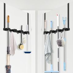 there are two hooks on the wall holding cleaning supplies