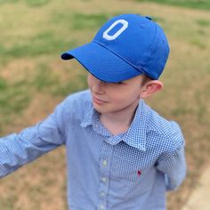 "This customized toddler/youth baseball cap is the perfect addition to a special day. It is soft cotton & adjustable. FEATURES: >100% bio-washed chino twill >Unstructured, six-panel, low-profile >Pre-curved visor >Self-fabric tri-glide buckle closure >Size fit: 6 1/2\" - 7 1/4\" >This hat comes with one appliqued letter or number of your choice, the letter is stitched to the hat. Note: The letter color is generally white. If you would like to purchase a white hat...please l Casual Adjustable Baseball Cap For School, Personalized Casual Baseball Cap For Sports Events, Personalized Adjustable Baseball Cap With Curved Bill, Personalized Baseball Cap With Curved Brim, Personalized Blue Cotton Hats, Personalized Baseball Cap With Curved Bill For Baseball Season, Personalized Curved Bill Baseball Cap For Baseball Season, Customizable Blue Baseball Cap With Curved Brim, Personalized Baseball Cap For Baseball Season