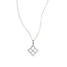 Lotus is an 18k white gold reversible diamond pendant by Gumuchian featuring 0.33ctw of G/VS diamonds. Sold with chain.