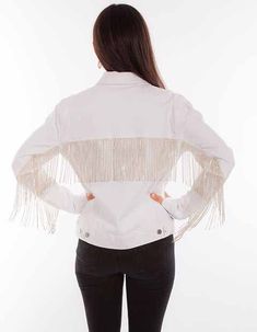 White Denim Jacket with Rhinestone Fringe by Scully. This classic jean jacket features a new twist with added long fringe across the back and sleeves. It has a button front, two chest flap pockets and two lower vertical side entry pockets. Machine wash cold gentle cycle with like colors and tumble dry low. Perfect western style jacket for any cowgirl. Color: White Flat rate shipping of $14 applies to leather coats and jackets. American West Handbags, Belt Buckle Jewelry, Denim Rhinestone, Flannel Vest, Leather Coats, Jacket Collection, Rhinestone Fringe, Ranch Wear, Leather Company