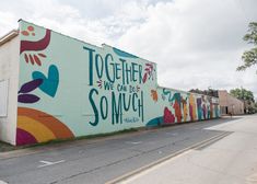 a mural on the side of a building that says together we can do so much