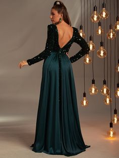 Product Code: FSWD0538 Embellishment: Sequin Fabric: 100% Polyester Back Style: Zipper Up Fully Lined: Yes Built-in Bra: No Available Color: Dark green Stretch: Moderate Fits true to size Imported Model Information: Height: 5' 2" Bust: 33.5'' Waist: 24“ Hips: 35.5” wearing US size Small Fitted Dark Green Evening Dress For Party, Green Long Sleeve Evening Dress For Party Season, Green Sequined Evening Dress For Banquet, Green Sequined Evening Dress For Banquets, Green Sequin Dress For Banquet, Dark Green Sequin Party Dress, Fitted Dark Green Evening Dress For Banquet, Dark Green Floor-length Party Dress, Green V-neck Evening Dress With Sequins