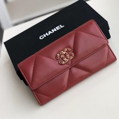 Length: 7.5 in Height: 4.25 in Width: 1 in COMES WITH Dust bag We this is an CHANEL Lambskin Quilted Chanel 19 Flap Wallet Black or This stylish wallet is crafted of luxurious quilted lambskin in Red with an aged gold leather threaded Chanel CC logo.A Elegant Quilted Wallet For Formal Occasions, Elegant Quilted Wallets For Formal Occasions, Luxury Quilted Clutch For Formal Events, Luxury Quilted Clutch For Formal Occasions, Elegant Quilted Rectangular Wallet, Designer Leather Wallet With Quilted Detail, Designer Quilted Leather Wallet, Classic Formal Quilted Wallet, Elegant Quilted Leather Wallet