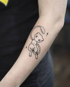 a person with a small tattoo on their arm