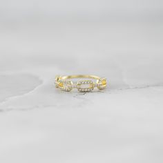 Beautiful chain ring that is great for stacking or worn alone! Pave stones make this look super elegant! Made of 925 Sterling Silver We use a THICK, DURABLE 14k Gold or Rhodium plating - for a piece that will last you years to come! VERY HIGH QUALITY Available in sizes 4-12 Nickel-Free & Hypoallergenic We use the highest grade cubic zirconia stones for an authentic diamond look! Layering Diamond Necklaces, Link Ring, Linking Rings, Pave Ring, Delicate Chain, Chain Design, Delicate Earrings, Ring Size Guide, Chain Ring