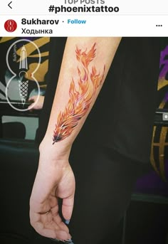 a person with a fire tattoo on their arm