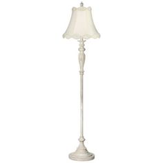 a white floor lamp on a white background