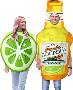 a man and woman are wearing costumes made to look like lemons, limes and soda bottles