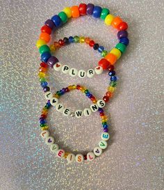 "Show your colors for the entire year with this love is love bracelet! This makes a great everyday wear as well and anyone can wear this colorful bracelet❤️. Check out our pride collection for more unique designs that are truly OOAK. *Stretchy *Choose your wrist size below ( If this is a gift and you are unsure of their wrist size, you can include their age or either say small, medium, or large before checkout. Add this info in \"Add note\". An alternative option is also sending a picture of the Lgbt Bracelet, Hobby Inspiration, Handmade Friendship Bracelets, Pride Bracelet, Colorful Bracelet, Pride Collection, Rainbow Bracelet, Love Bracelet, Bracelet Crafts