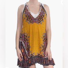 Free People Steal The Sun Boho Flowy Dress. Size Xs. Please Check Fit Based On Measurements Provided Below. Please Ask For More Measurements If Needed. Inseam: 30” Pit To Pit: 16” From Dog Friendly Home Open To Reasonable Offers All Items Not Marked As New, Nwt Or Nwot Are In Gently Used Condition And May Have Flaws. Please Ask Any Additional Questions Or For Additional Photos Prior To Purchasing. Yellow V-neck Boho Dress For Spring, Bohemian Mustard V-neck Dress, Yellow Flowy Dress With Boho Print, Flowy Yellow Dress With Boho Print, Flowy Yellow Boho Print Dress, Yellow Casual Boho Beach Dress, Casual Yellow Boho Print Dress, Yellow Spring Boho Dress For Festivals, Casual Yellow Boho Beach Dress