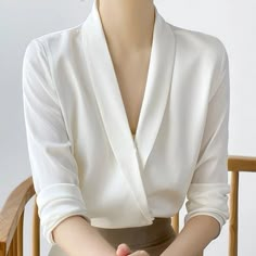 Fitted V-neck Blouse For Office, White V-neck Office Blouse, Spring V-neck Shirt For Office Wear, Spring V-neck Office Blouse, Spring V-neck Blouse For Office, Professional V-neck Top, Solid V-neck Office Tops, Fitted V-neck Office Lady Blouse, Fitted V-neck Office Blouse