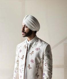 Editor's Note Handpaint On A Silk Base With Hand Texturing Highlighted With 3d Brass Elements And Dabka. Paired With A Shoulder Placket Silk Ivory Kurta And Trouser Fabric: Slub Silk Color: Ivory Component: Jacket, Kurta, Trousers Care: Dry Clean Only About the Designer After establishing himself as the leading couturier in the industry of menswear, Jatin Malik went on to explore luxury footwear. You can order online these amazingly designed handmade shoes that are being offered in classy Caliga White Embroidered Fitted Bandhgala, White Fitted Embroidered Bandhgala, Fitted White Embroidered Bandhgala, White Fitted Nehru Jacket For Spring, Elegant White Sherwani For Spring, White Embroidered Fitted Nehru Jacket, White Embroidered Bandhgala For Spring, Elegant White Bandhgala For Spring, Fitted Wedding Outerwear With Floral Embroidery