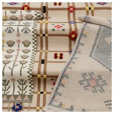 several rugs with different patterns and colors are shown in close up on a white background