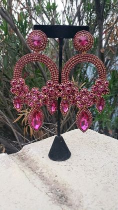 Pink Crystal-embellished Jewelry For Party, Pink Crystal Embellished Jewelry For Party, Glamorous Pink Crystal-embellished Jewelry, Glamorous Pink Bling Jewelry, Glamorous Pink Jeweled Jewelry, Pink Jeweled Crystal Dangle Earrings, Pink Sparkling Earrings For Party, Elegant Pink Chandelier Earrings, Glamorous Pink Party Jewelry