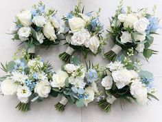 wedding bouquets laid out on the wall