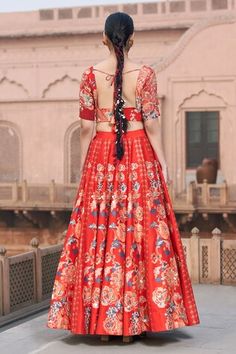 Red lehenga featuring floral digital printed motifs and sequins embroidery. Paired with a zari embroidered blouse with a sweetheart neckline and half sleeves., Fit: Relaxed Fitted Traditional Wear With Printed Motifs For Reception, Silk Lehenga With Printed Motifs For Reception, Wedding Lehenga With Printed Motifs For Diwali, Bollywood Wedding Choli With Printed Motifs, Festive Printed Motifs Lehenga For Reception, Festive Lehenga With Printed Motifs For Reception, Festive Printed Lehenga For Reception, Festive Reception Lehenga With Printed Motifs, Fitted Wedding Choli With Printed Motifs