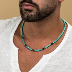 Looking for a gift for your man? You've found the perfect item for this!  This unique turquoise beaded necklace for men is the perfect accessory to add a touch of style to any outfit. Handcrafted with high-quality turquoise beads, this necklace is set with 5 striking black onyx beads for a bold and sophisticated look. Whether you're dressing up for a special occasion or looking to elevate your everyday style, this statement piece is sure to make a statement. Add this stunning necklace to your co Men Necklaces, Mens Beaded Necklaces, Mens Jewellery, S Jewelry, Mens Jewelry Necklace, Turquoise Bead Necklaces, Black Bead Necklace, Stone Beaded Necklace, Necklace Turquoise