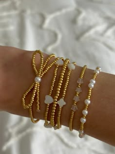 clover bracelet – ivory moon Coastal Beaded Bracelets, Birthday Bracelet Ideas, Gold Stacked Bracelets, Cute Bracelet Stacks, Girly Stuff To Buy, Jewelery Stacks, Gold Jewelry Stack, Preppy Bracelet Stack, Dainty Bracelet Stack