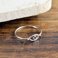 Evil Eye Ring, Silver Ring, Evil Eye Jewelry, Stacking Rings, Birthday Gifts for Her, Gift for Women, Minimalist ring, Evil eye ring This Dainty & Adorable Evil Eye Ring is a the perfect gift for someone SPECIAL! This sterling silver evil eye ring is perfect for stacking. While evil eye amulets were first recorded by the Mesopotamian's about 5,000 years ago on clay tablets, belief in their protective power is still strong in many parts of the world. People attach an evil eye amulet to everyt Elias Bouchard, Evil Eye Ring Silver, Evil Eye Amulet, Portrait Jewelry, Moonstone Engagement Ring Set, Moissanite Engagement Ring White Gold, Morganite Engagement Ring Set, Jewelry Stacking, Silver Rings For Women