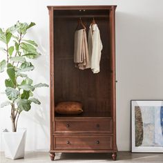 The simple storage space design is not cumbersome but can meet the daily storage needs, so that the interior of the wardrobe is clean and orderly, bringing convenience to life Parttlion | Parttlion American style retro simple wardrobe brownWood in Walnut | 86.6" H X 39.3" W X 23.6" D | Wayfair Wardrobe Brown, Bedroom Armoire, Simple Wardrobe, Mudroom Furniture, Space Design, Woodstock, Duvet Comforters, Style Retro, American Style