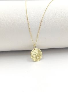 Welcome to ElegantGoldJewels,  Find all the information you need about your charm: Material of pendant: 14K Solid Gold Stamp: 585 (14K) Thickness: 0.5mm Jumpring Diameter: 4mm The pendant is available in 6 sizes: - 13mm / 0.52 inches - 15mm / 0.59 inches - 18mm / 0.70 inches - 20mm / 0.78 inches - 22mm / 0.86 inches - 24mm / 0.94 inches - 26mm / 1.02 inches - 28mm / 1.10 inches - 30mm / 1.18 inches Chains Information: Rolo Chain: -14K Real Gold - 0.70mm thick - Spring Ring Clasp - 16 inches / 40 14k Gold Spiritual Coin Necklace With Round Pendant, Round Locket Jewelry For Commemoration, Commemorative Locket Jewelry, Round Amulet Coin Necklace With Charms, Amulet Style Coin Necklace With Charms, Amulet Style Commemoration Necklace With Round Shape, Spiritual Coin Charm Jewelry, Commemorative Amulet Necklaces With Round Shape, Spiritual Coin-shaped Charms Jewelry