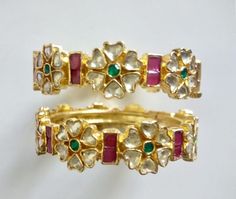 *This is Sterling Silver 22k Gold Plated Kundan Bangles.Its perfect for Wedding Occasion as well as Unique and Ethnic Traditional Bangle to gift and Also Bridal wear to match with Wedding Outfits. *Its 925 silver with handcut kundan stone settings and 100% Handmade screwed bangles pair. *Its Beautifully Multi color pink n green Like shown in picture. *Its available in 2.4 size only for now other sizes will be made to order. *Its open able Screwed Bangles Pair. *All Kundan stones set with silver Punjabi Wedding Jewelry, Indian Wedding Bangles, Indian Kundan Jewellery, Bracelets Indian, Wedding Bangles, Flexible Bracelet, Kundan Bangles, Wedding Bride Jewelry, Punjabi Wedding