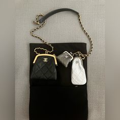 Chanel Multi Clutch With Chain Quilted Leather Overview Exterior Color Black, Silver Interior Color Black, Silver Exterior Material Leather Interior Material Leather Hardware Color Aged Gold Accessories Extra Pochette Pochette 2 Of The Purses Can Be Removed And Used As Wallets Or Coin Purses!! Unique And Rare Bag!!! Size And Fit 4"W X 4"H X 1"D 22" Strap Drop Luxury Black Coin Purse With Interior Key Chain Holder, Elegant Black Bag For Personal Use, Chanel Wallet On Chain, Chanel Chevron, Chanel Tote Bag, Chanel Jumbo, Chanel Chain, Chanel Flap Bag, Chanel Tote