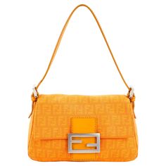 Fendi baguette mini Mamma in orange zucchino monogram canvas and leather, silver hardware. Condition: Really good, to note: slight scratches on front logo. Packing/accessories: Dustbag. Measurements: 22cm x 13cm x 10cm Silver Fendi Baguette, Fendi Baguette Mini, Fendi Mini Baguette, Packing Accessories, Orange Handbag, Fendi Mini, Fendi Bag, Dream Bags, Fendi Baguette