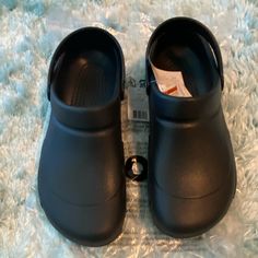 Brand New With Tags/Original Packaging. Never Worn. Fit Big. Black Flat Synthetic Clogs, Black Synthetic Flat Clogs, Flat Black Synthetic Clogs, Black Flat Clogs With Cushioned Footbed, Black Non-slip Flat Clogs, Black Clogs With Cushioned Footbed And Round Toe, Black Non-slip Comfortable Clogs, Comfortable Slip-resistant Black Clogs, Comfortable Non-slip Black Clogs