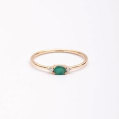 Elevate your style with our Oval Cut Emerald Ring in 14k/18k Solid Gold. Perfect for stacking or as a statement piece.  Celebrate love with this stunning emerald and diamond ring. Shop now and cherish forever! Material: Solid Real Gold (Not gold plated or gold fill) Available Gold Karat: 14K (585), 18K (750)  Available Gold Colors: Yellow, rose, white Gemstones: Natural emerald, natural diamond Number of Emeralds: 1 Emerald shape: Oval cut Emerald size: 3x4 mm Emerald CTW: 0.14 Ct Diamond Color: Fine Jewelry Stackable Oval Rings, White Gold 14k Rings For May Birthstone, 14k Gold Ring With May Birthstone, 14k Gold May Birthstone Ring Fine Jewelry, 14k Gold Rings With May Birthstone, Stackable 14k Gold Cluster Ring Fine Jewelry, Heirloom Stackable Emerald Ring In Yellow Gold, 14k Gold Oval Diamond Stackable Ring, Oval 14k Gold Stackable Diamond Ring