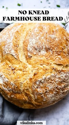 a loaf of bread with the words, no knead farmhouse bread on it's side