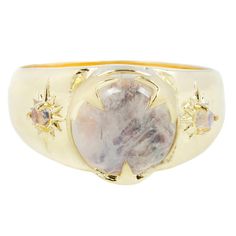 A reimagined signet with modern day detailing, this mystical piece has two 2mm gemstones on each side of a rainbow moonstone held by stars. 9mm rainbow moonstone 2mm rainbow moonstone gold plated brass or sterling silver finish: high-polish  general product measurements width: 0.77"height: 1" HANDEMADE IN USA Please ke Celestial Gold Moonstone Ring, Adjustable Celestial Gemstone Jewelry, Moonstone Jewelry With Large Round Stone, Adjustable Moonstone Jewelry With Round Stone, Gold Moonstone Ring With Natural Stones, Round Moonstone Jewelry With Large Stone, Mystical Moonstone Jewelry With Large Stone, Adjustable Mystical Moonstone Ring With Natural Stones, Gold Moonstone Ring With Moon Phase Detail