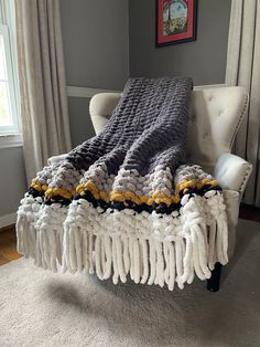 Chunky Knit Fringe Blanket | Gray and Yellow Knit Throw - Hands On For Homemade Gray Chunky Knit Blanket, Gray Afghan Crochet, Black And White Chunky Knit Blanket, Knit Blanket Color Schemes, Chunky Blanket Color Ideas, Chunky Knit Blanket Ideas, Chunky Knit Blanket Pattern Color Combos, Chunky Blanket Crochet, Big Yarn Blanket