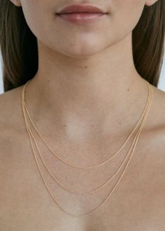 Necklace chains date back to 2500 BC, when the Ancient Egyptians threaded gold and silver together.The Rolo Chain is a wardrobe staple. Use her to hang your grandmother's favorite pendant, or wear layered with our Pico Link Chain.Want a bolder look? Shop our coveted Box Chain Necklace.Model is wearing a 20" Rolo Link Chain Necklace. 14k solid gold—always Weight: Approx 1.3g Width: 1.2mm Spring clasp closure Pendants sold separately We offer custom sizes upon request. You can add a custom necklac Necklace Model, Fall Rings, Gold Baroque, Box Chain Necklace, Broken Chain, Link Chain Necklace, Rolo Chain, Custom Necklace, Necklace Sizes