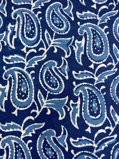 a blue and white paisley print fabric