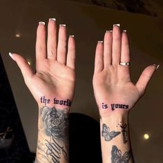 two hands with tattoos that say the truth is yours and butterflies on their wrists