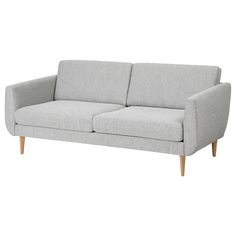 a gray couch with wooden legs on a white background