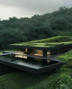 the house is surrounded by lush green hills