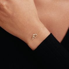 "1- P R O D U C T ∙  D E S C R I P T I O N Showcase your love with our Interlocking Heart Bracelet in 14K Solid Gold. Perfect as a couple bracelet or a stunning gift for her, this double heart bracelet captures the essence of romance. Crafted from 14k solid gold, it adds a touch of luxury to any outfit. This 14k gold jewelry is not just a purchase, but an investment in timeless style. 2- P R O D U C T ∙  D E T A I L S Gold material: 14K solid gold Choice of gold color: Yellow gold, Rose gold, White gold Choice of chain length: 5\", 5.5\", 6\", 6.5\", 7\" +1\" Extender Dimensions: * Height: 9 mm /  0.35 in * Width: 12 mm /  0.47 in 3- S H I P P I N G ∙ A N D ∙ R E T U R N S We know you're excited to get your hands on your order, and we're just as excited to get it in your hands. We take pri Elegant Open Heart Bracelets, Elegant Open Heart Bracelets For Everyday, White Gold Heart Diamond Bracelet For Valentine's Day, Heart-shaped White Gold Diamond Bracelet For Valentine's Day, Elegant Open Heart Bracelets For Mother's Day, Valentine's Day White Gold Heart Diamond Bracelet, Valentine's Day Heart-shaped White Gold Diamond Bracelet, Elegant Double Heart Everyday Bracelet, Elegant Double Heart Bracelet For Everyday