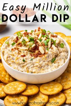 a white bowl filled with dip surrounded by crackers