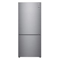 a silver refrigerator freezer sitting on top of a white wall