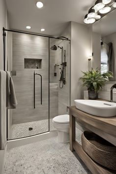 a bathroom with a sink, toilet and shower