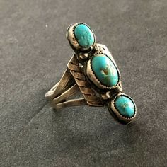 "VINTAGE NAVAJO RING DESCRIPTION: This fabulous old ring will be a treasured addition to your collection of fine vintage Native American jewelry. MEASUREMENTS: Ring face measures 1 1/8\" x 1/2\" RING SIZE: 7 WEIGHT: 4.8 grams SIGNED: no STERLING: unmarked, verified sterling silver" Vintage Oval Turquoise Ring Collectible, Vintage Sterling Silver Turquoise Ring, Vintage Turquoise Open Ring For Anniversary, Vintage Open Turquoise Ring For Anniversary, Vintage Untreated Collectible Rings, Untreated Vintage Collectible Rings, Vintage Turquoise Ring With Patina For Gift, Vintage Turquoise Open Ring Adjustable, Vintage Stamped 925 Turquoise Collectible Ring