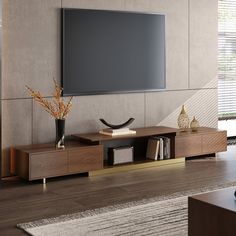 a living room with a large flat screen tv mounted on the wall and wooden furniture