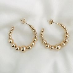 For lovers of silver jewelry, we present our classic ball earrings that will always give you a modern and attractive look. Medium Hoops Width: 33mm Bead Width Range: 3.8mm - 7.8mm Small Hoops: 29 mm FAST & FREE SHIPPING. Our handmade products are rated very highly by our customers. We work hard with our Quality Control department to ensure the quality you deserve. -New! -Excellent quality. Looks even better in person. -This is a product for women -Check out my other jewelry listings in my store! Elegant Nickel Free Hoop Beaded Earrings, Elegant Nickel-free Hoop Beaded Earrings, Elegant Nickel-free Beaded Hoop Earrings, Elegant Hoop Beaded Earrings For Pierced Ears, Elegant Hoop Beaded Earrings, Elegant Everyday Hoop Earrings With Round Beads, Dangling Beads Round Earrings, Everyday Round Earrings With Dangling Beads, Elegant Small Hoop Earrings With Dangling Beads