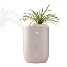 Dry indoor air can lead to static electricity, thirsty houseplants, and even dry skin—making breathing and sleeping conditions uncomfortable. The Homedics Natura Ultrasonic Warm & Cool Mist Humidifier combats dryness with a nozzle that converts water into a fine warm or cool mist, evenly releasing the perfect amount of moisture for spaces up to 402 sq. ft.* This sleek, modern humidifier, consciously crafted with recycled materials, not only enhances your decor but also includes a programmable di Modern Humidifier, Plant Humidifier, Humidifier For Plants, Waterless Diffuser, Paraffin Bath, Baby Sound Machine, Percussion Massager, Mist Humidifier, Crafts From Recycled Materials