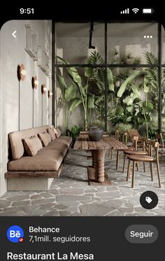 an image of a living room with plants on the wall and furniture in the background