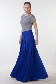 Long blue skirt with pockets from comfy jersey fabric. Skirt length 105 centimeters. Model wears size US 6, she is 160 cm tall with 10 cm heels. Her skirt is 105 cm long Please, use this size chart to select your size US 0 Bust 82 cm (32.5 inches) Waist 64 cm (25 inches) Hips 89 cm (35 inches) US 2 Bust 85 cm (33.5 inches) Waist 66 cm (26 inches) Hips 92 cm (36 inches) US 4 Bust 88 cm (34.5 inches) Waist 68 cm (27 inches) Hips 94 cm (37 inches) US 6 Bust 90 cm (35.5 inches) Waist 71 cm (28 inche Stretch Flared Maxi Skirt With Gathered Details, Flowy Gathered Skirt With Wide Hem, Stretch Full Length Gathered Skirt Bottoms, Full Length Stretch Gathered Skirt Bottoms, Stretch Full Length Pleated Skirt With Lining, Relaxed Maxi Skirt With Pleated Wide Hem, Full Length Stretch Pleated Skirt With Lining, Stretch Full Skirt With Pockets, Solid Maxi Skirt With Relaxed Fit And Wide Hem